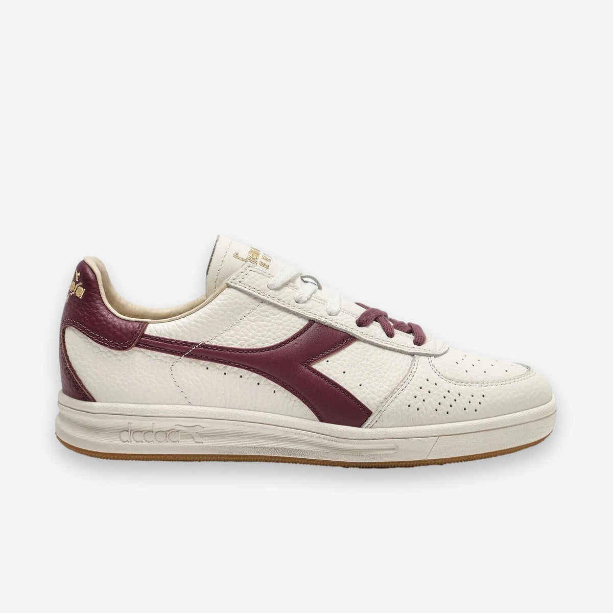 B. Elite Dominio Heritage White/Violet