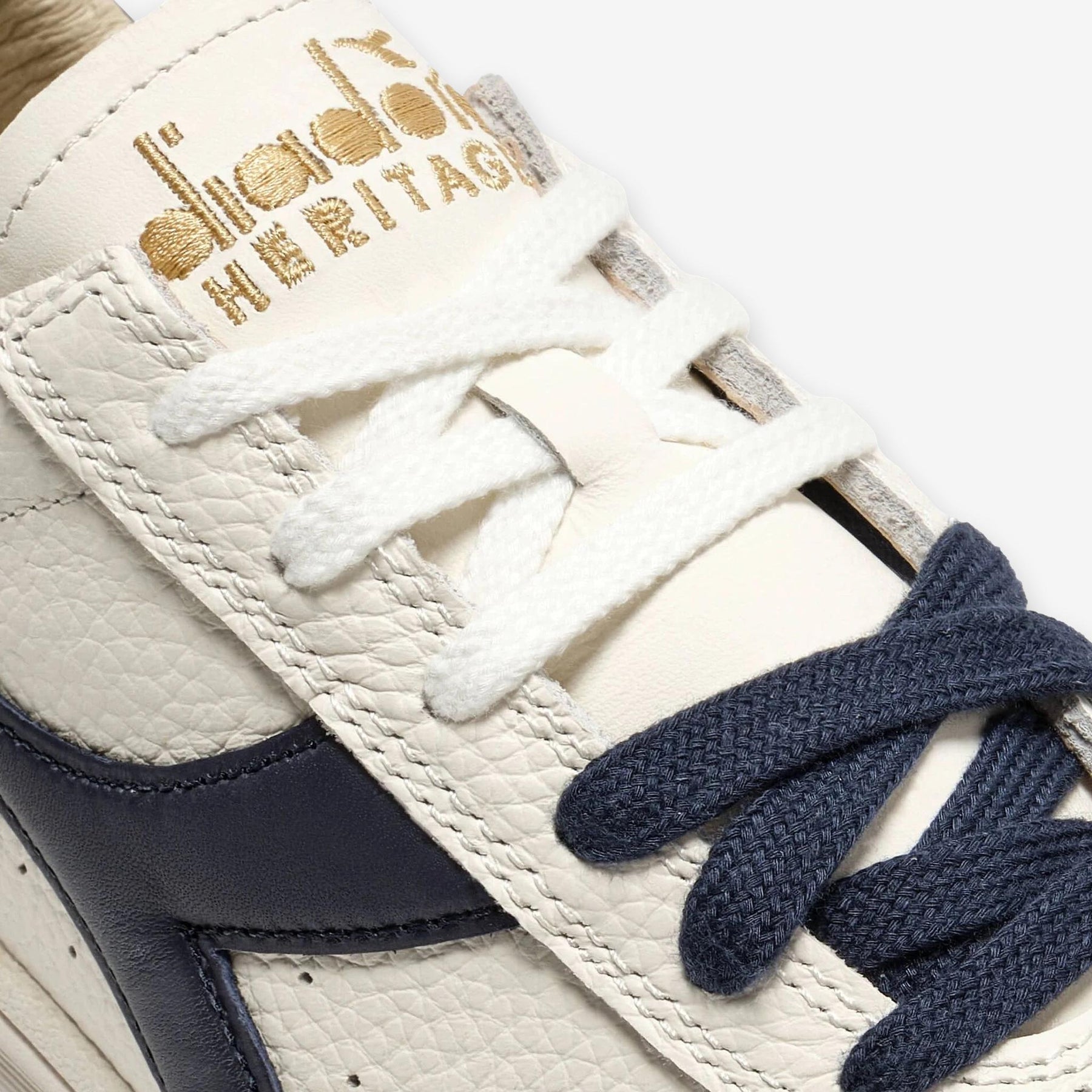 B. Elite Dominio Heritage White/Peacoat