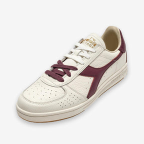 B. Elite Dominio Heritage White/Violet