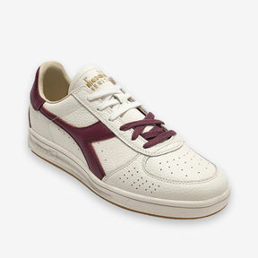 B. Elite Dominio Heritage White/Violet