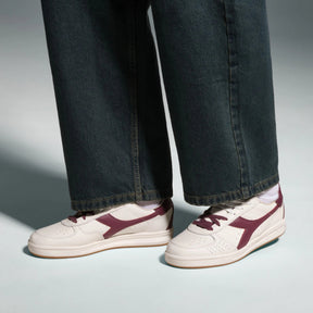 B. Elite Dominio Heritage White/Violet