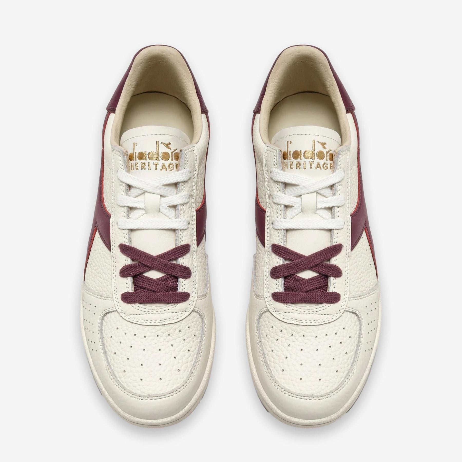 B. Elite Dominio Heritage White/Violet